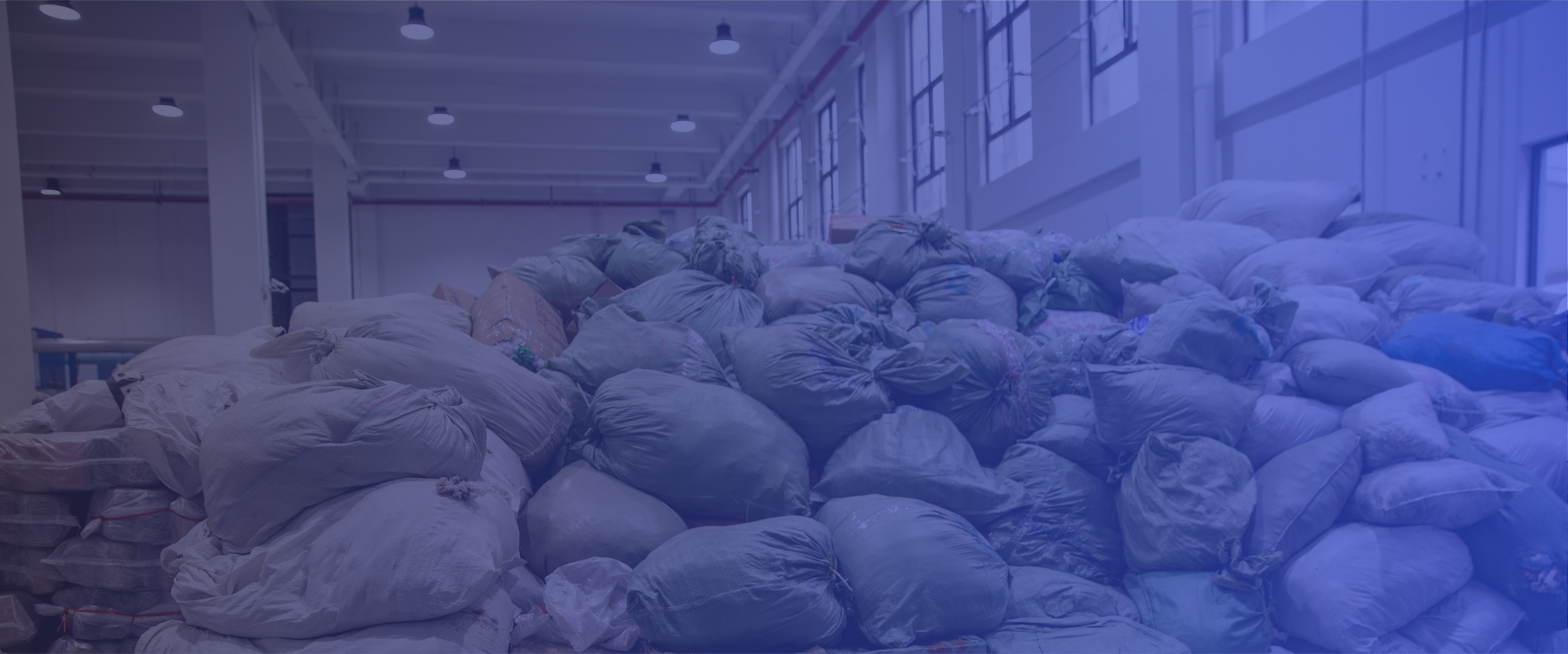 Post-consumer textile feedstock at scale